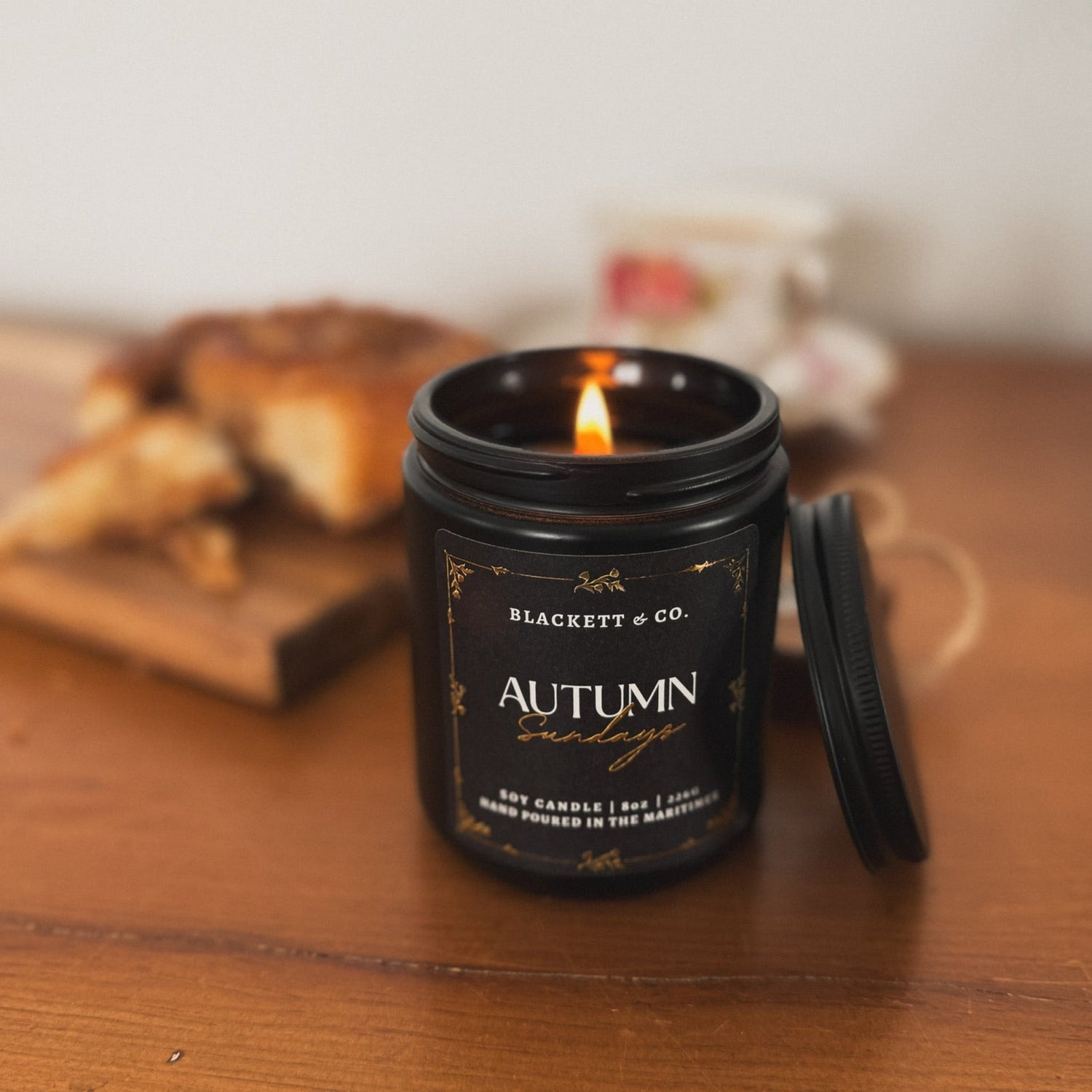 Warm and Earthy candle fragrances. Image of the Autumn Sundays scented soy candle.