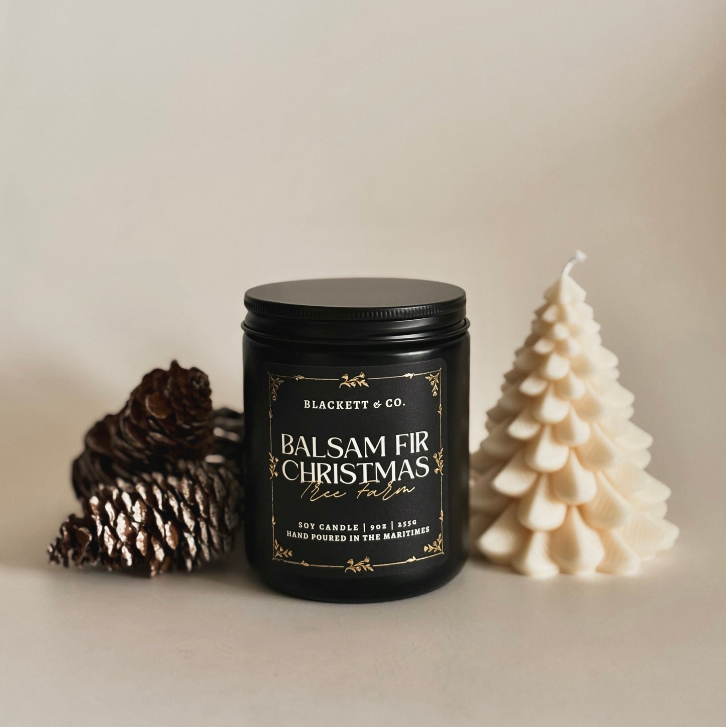 Balsam Fir Christmas Tree Farm soy candle handmade by Blackett & Co. and a balsam fir tree shaped candle.