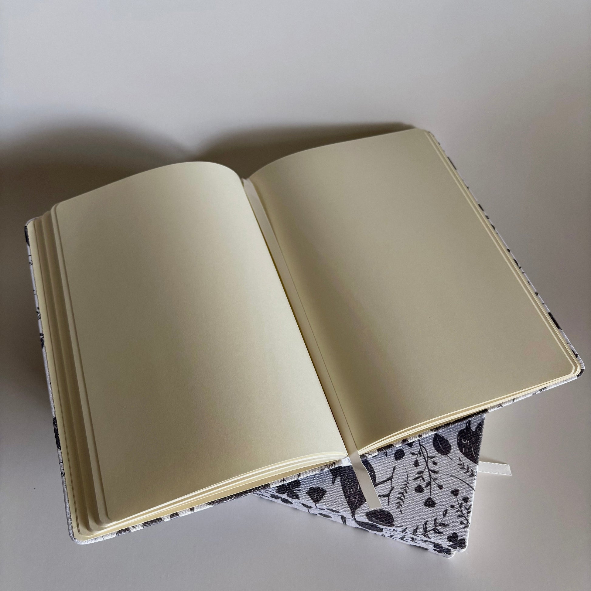 Blackbird notebook made from  100% recycled, tree-free materials including repurposed fabric, paper waste, soft cotton, and bamboo scraps.