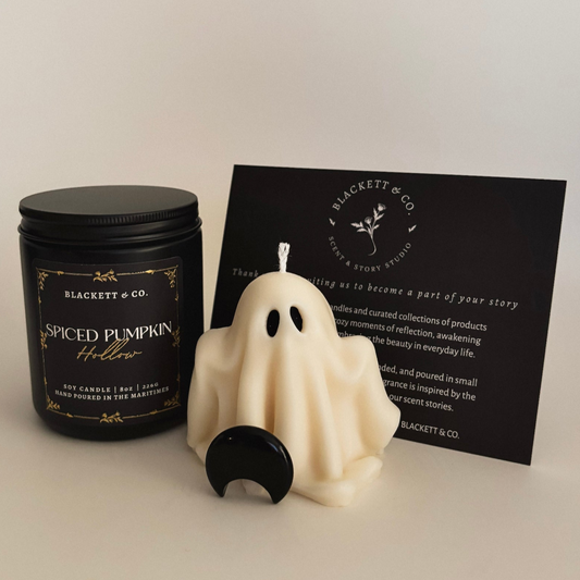 Spiced Pumpkin Hollow scented natural soy candle, unscented ghost-shaped soy candle, and Obsidian stone.