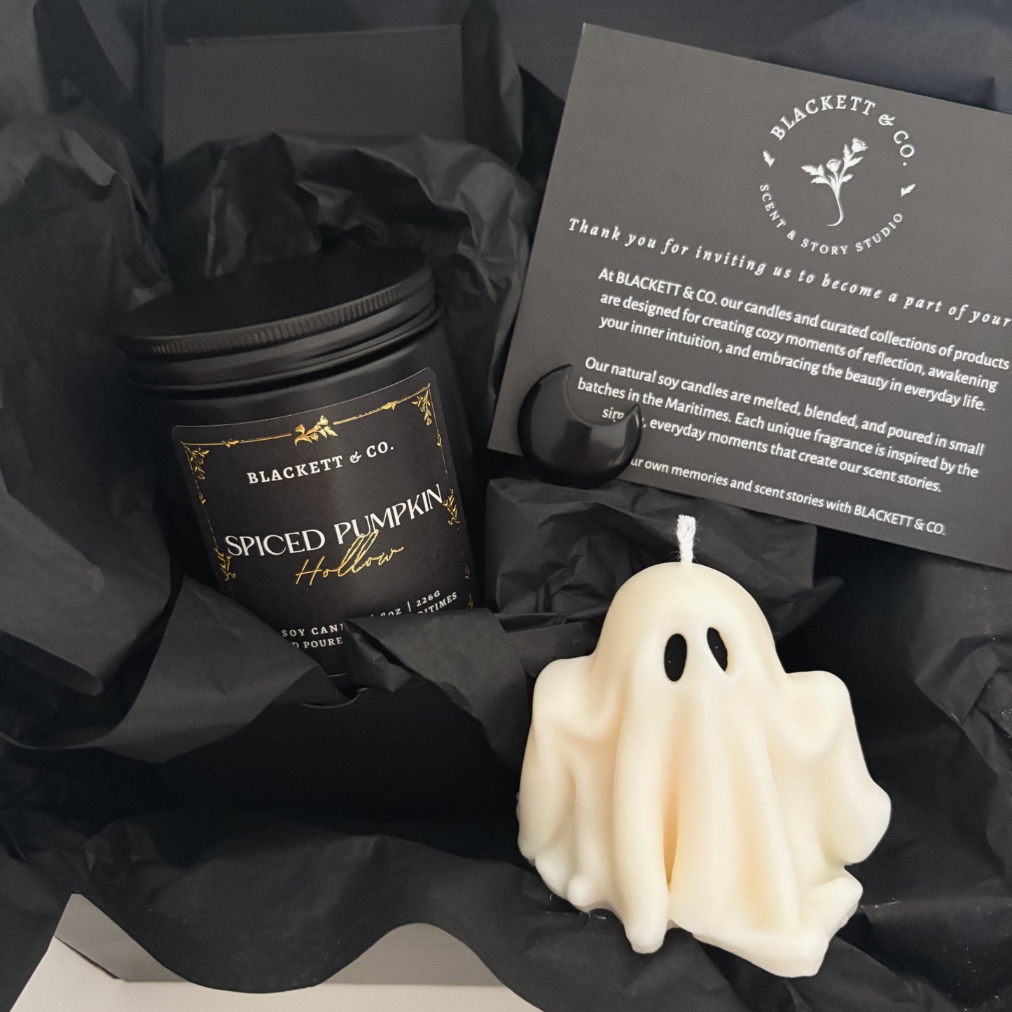 Spiced Pumpkin Hollow scented natural soy candle, unscented ghost-shaped soy candle, and Obsidian stone