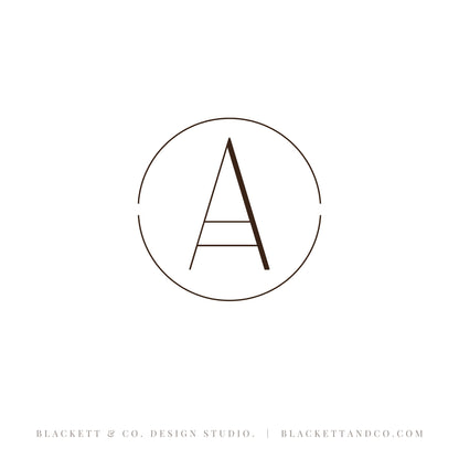 Artisan Brand Logo minimalist initial featuring a stylized letter enclosed in a partial circle.