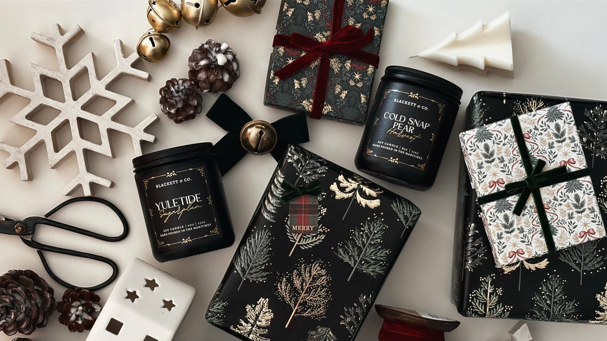 Decorative candles and gift boxes with festive designs, Holiday fragrances by Blackett & Co.