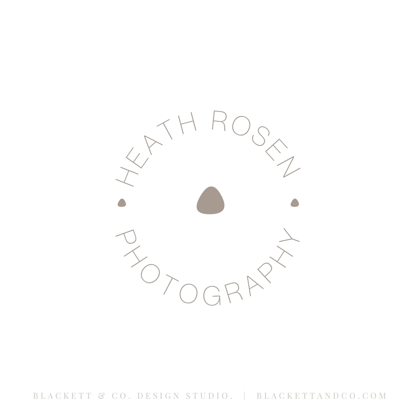 Photography brand logo minimalist circular logo with a small dot in the centre.