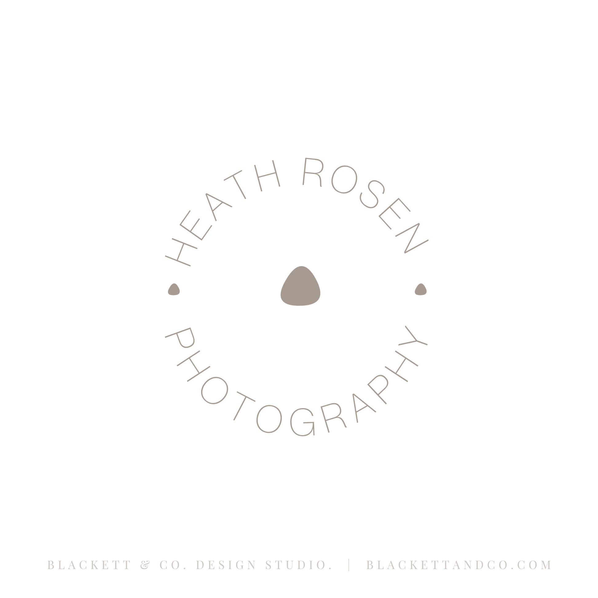 Photography brand logo minimalist circular logo with a small dot in the centre.