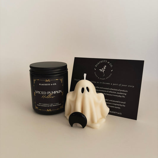 Spiced Pumpkin Hollow scented natural soy candle, unscented ghost-shaped soy candle, and Obsidian stone