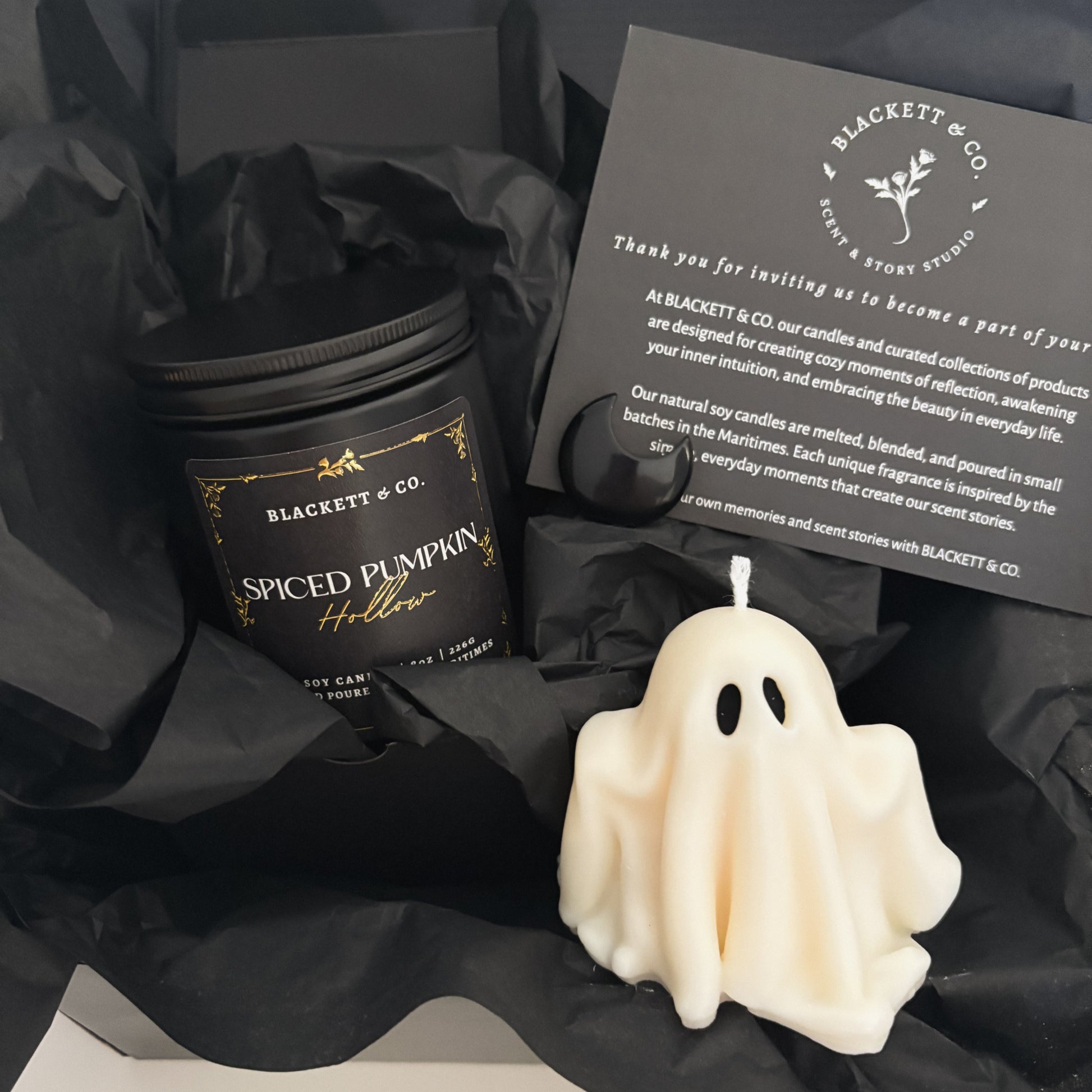 Spiced Pumpkin Hollow scented natural soy candle, unscented ghost-shaped soy candle, and Obsidian stone