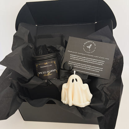 Spiced Pumpkin Hollow scented natural soy candle, unscented ghost-shaped soy candle, and Obsidian stone