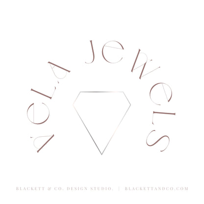 A minimalist logo design for Vela Jewels featuring a central diamond outline surrounded by arched brand lettering in a muted rose gold tone on a solid white background.