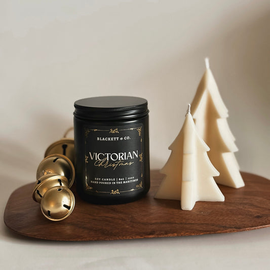 Victorian Christmas soy candle handcrafted by Blackett & Co. and soy candle fir trees.