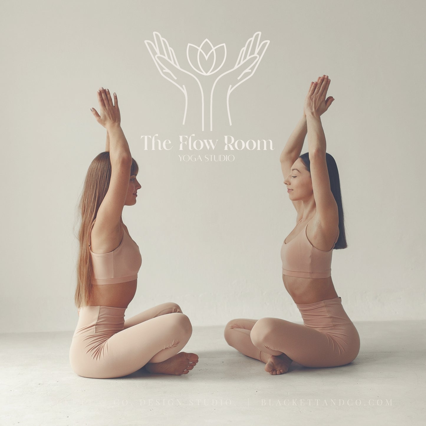 Flow Brand Logo image of two women in matching beige yoga apparel posing facing each other with arms raised in a minimalist studio setting. A white line-art logo and the text 'The Flow Room YOGA STUDIO' is centred above them.